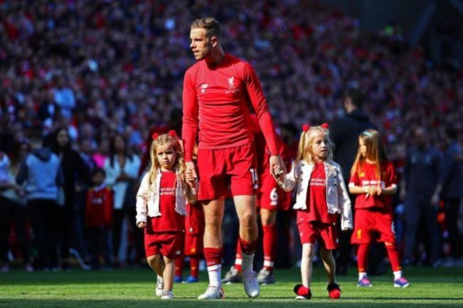 Liz Henderson's son, Jordan Henderson, and grandchildren.